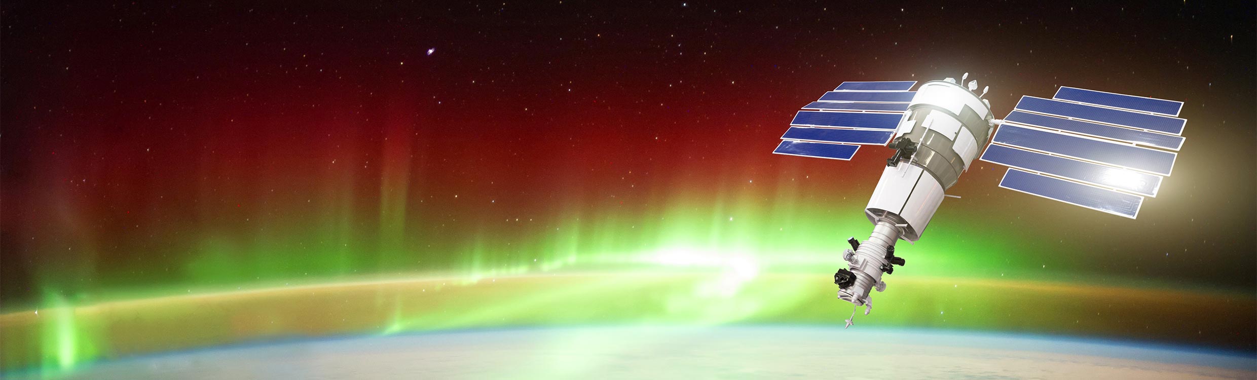 Satellite in space with aurora